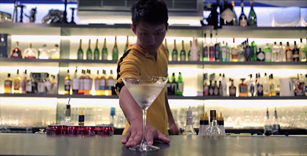 DRINK TO THE DEATH: Hsu Po Sheng imitates Bruce Lee from Game Of Death as he combines kung fu and mixology to stir and shake the crap out of your next drink.