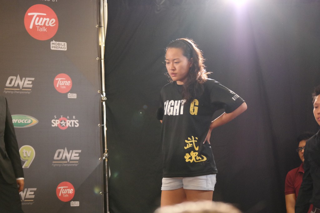 DESPONDENT: Sherilyn on the sideline of ONE FC's briefing.