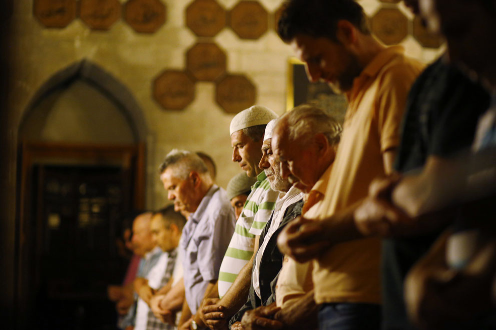 Muslims attend an evening communal prayer session called "Tarawih" to mark the holy fasting month of Ramadan at the Bajrakli mosque in Belgrade, Serbia, on July 9, 2013.
