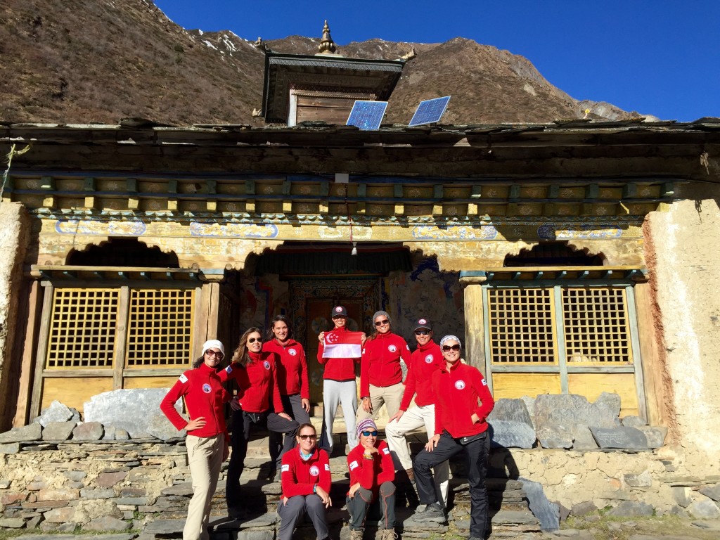 The WOAM team posing in front of the Mu Gompa monastery