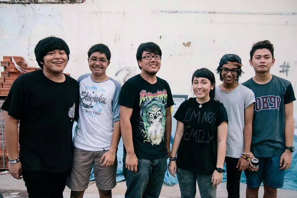 six-piece metalcore outfit, Emily In Denial. From left to right: Gio, Josh, Jerome, Trina, Tristan & Phillip.
