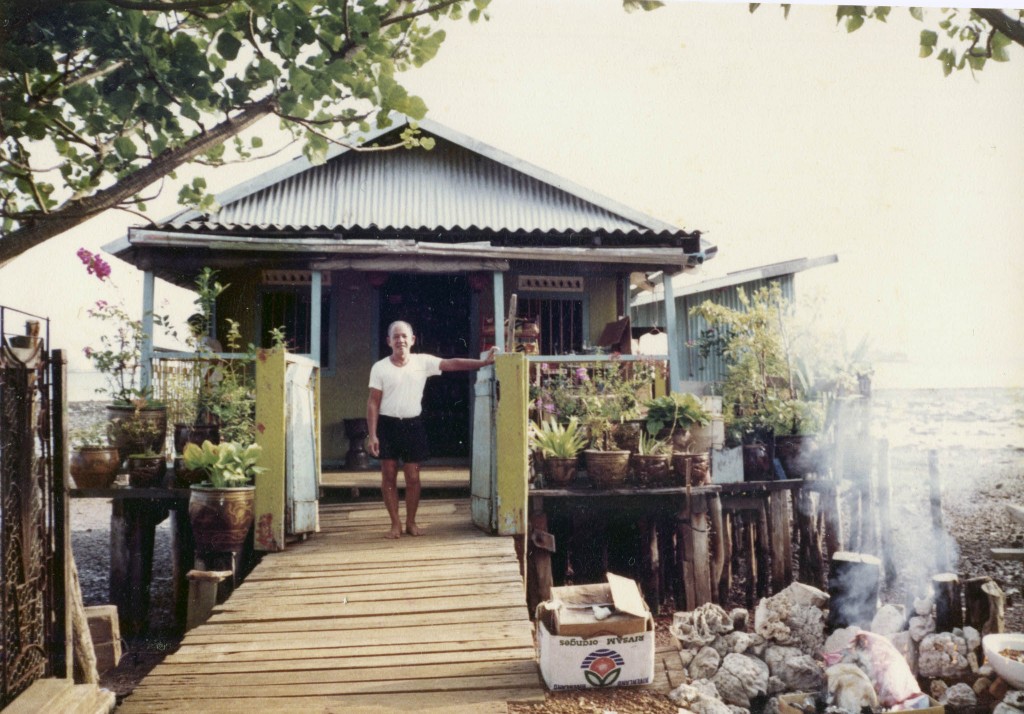 Teo Yen Teck standing in front of his provision shop on Pulau Seking in 1992. 