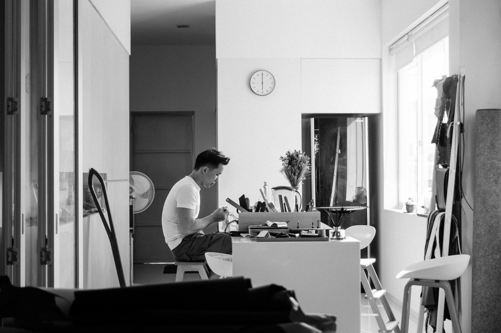 Roy at his work desk in his apartment 