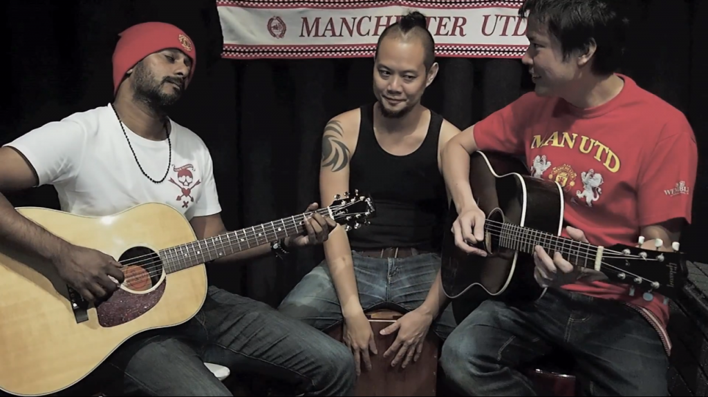 TACKY BACKGROUND CURTAINS: Rai, Andy and Jack performing OHHH MOYES.