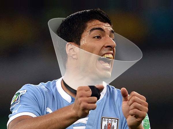CONE OF SHAME: Much love to Sharim Gubbels for contributing our cover photo. Sharim's Human Cone Of Shame x Luis Suarez series is not available in stores or at leading sports outlets.