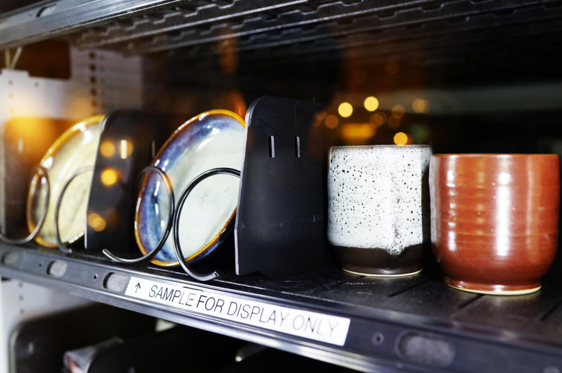 18-year-old SOTA student, Hans Chew hand-threw 360 ceramics over two months and placed them in a vending machine to challenge his audience to think about how much they value art.